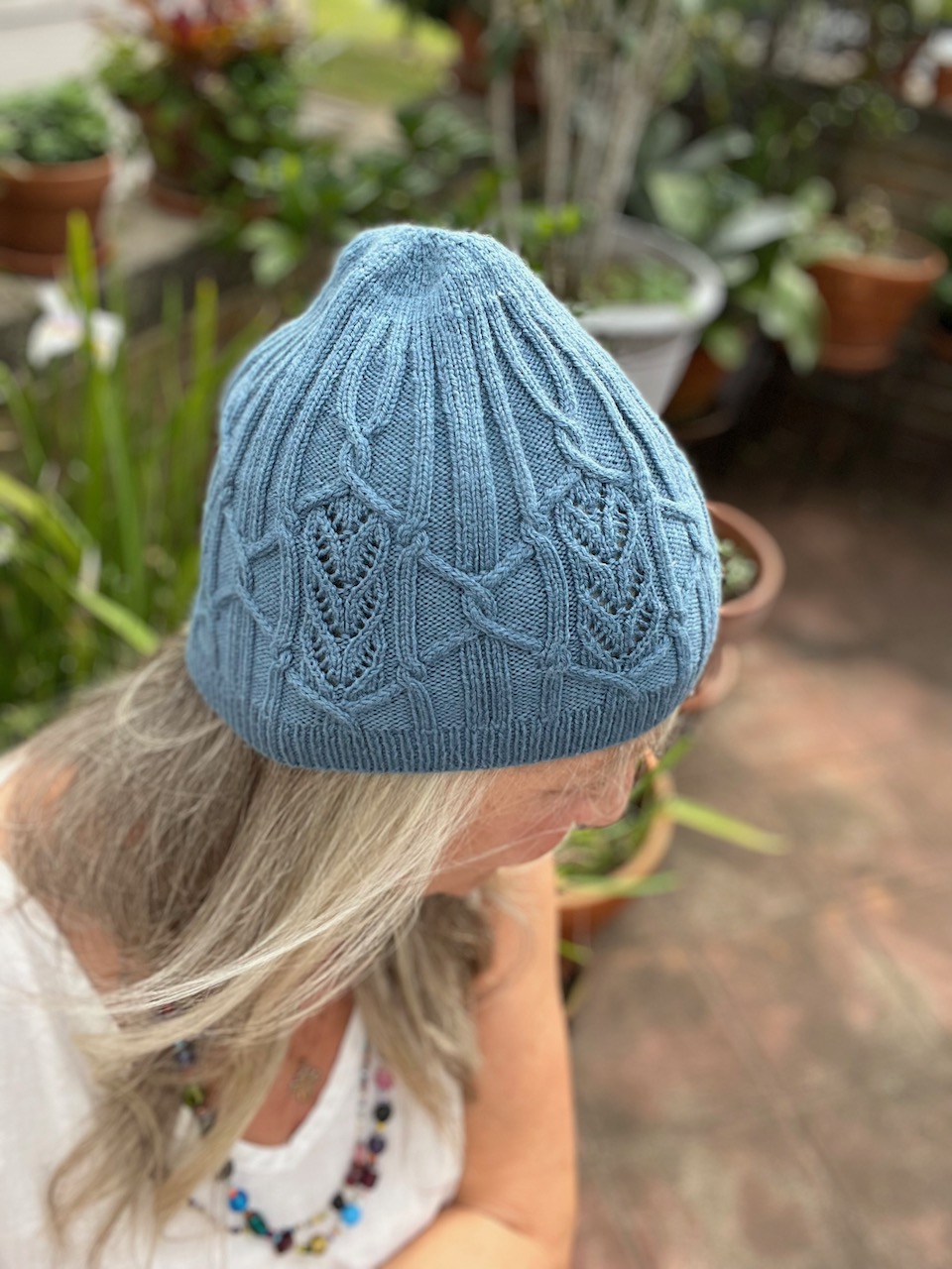 Beanie with cables and eyelets